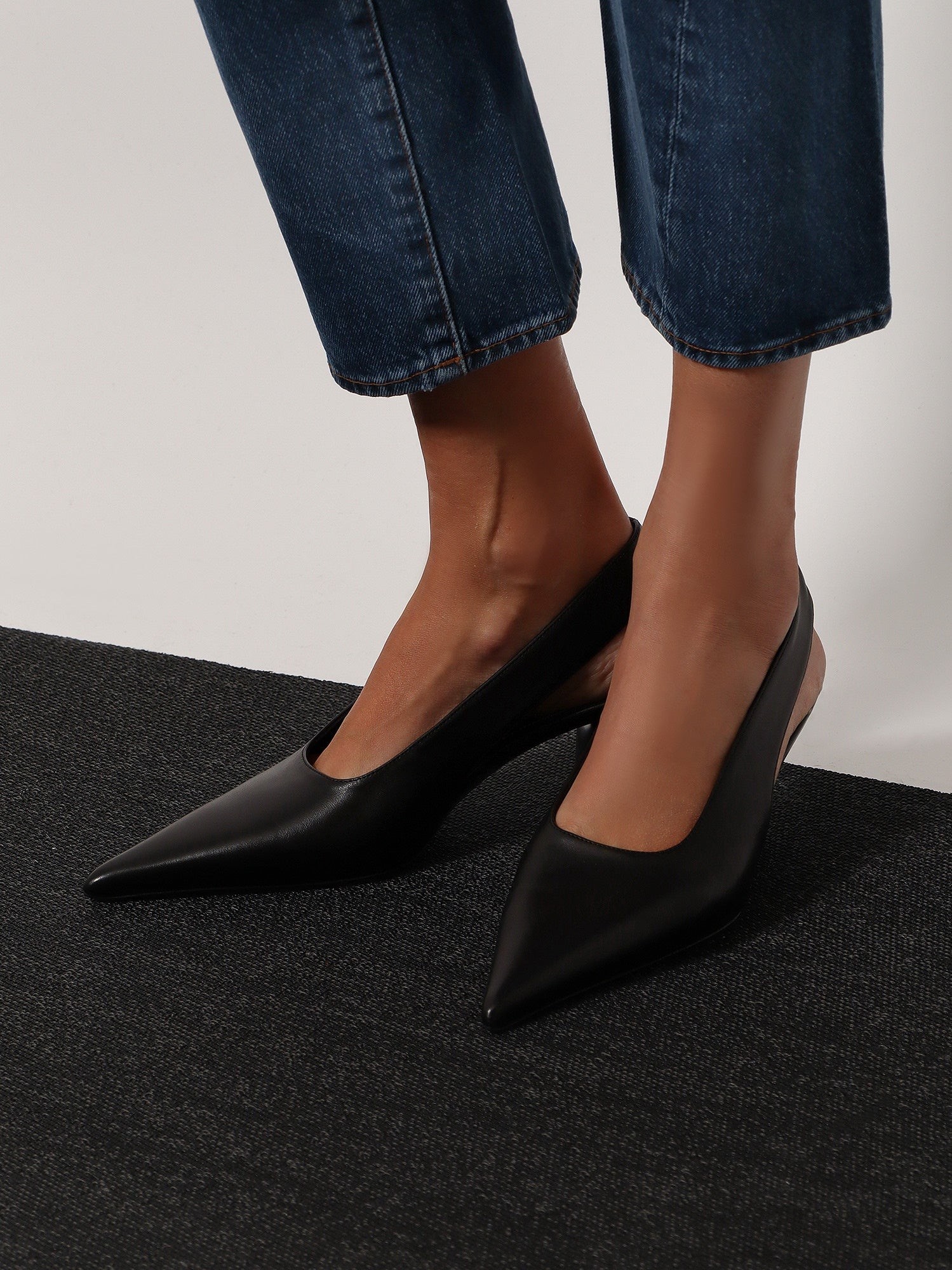 Leather décolleté slingbacks - Image 2