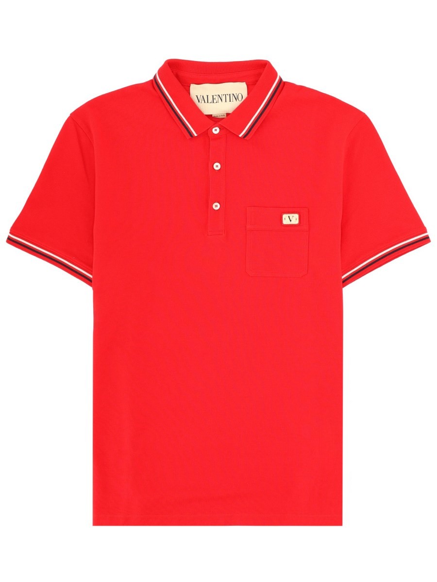 POLO CON PATCH LOGO